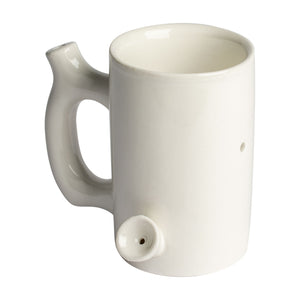 White Ceramic mug that is also a pipe. The mouth piece is on the handle and there is a bowl attached to the mug